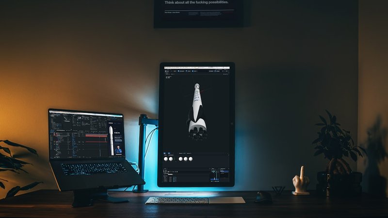 AI productivity workspace with multiple monitors