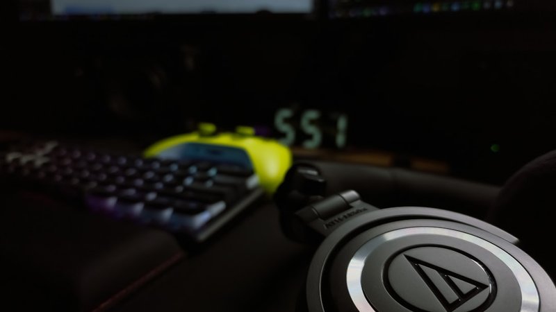 music production AI workspace headphones laptop