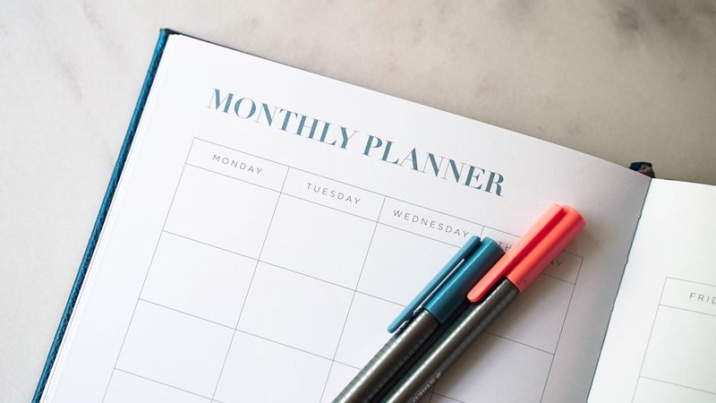 planning calendar with goals and notes