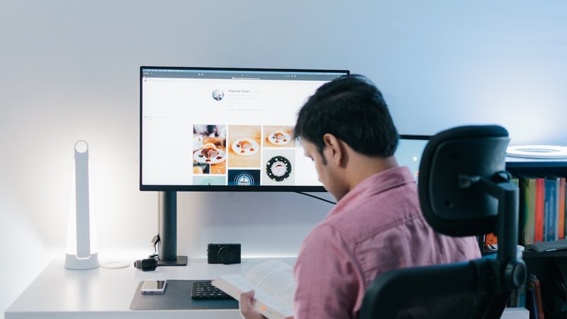 Person working efficiently with AI tools at modern desk